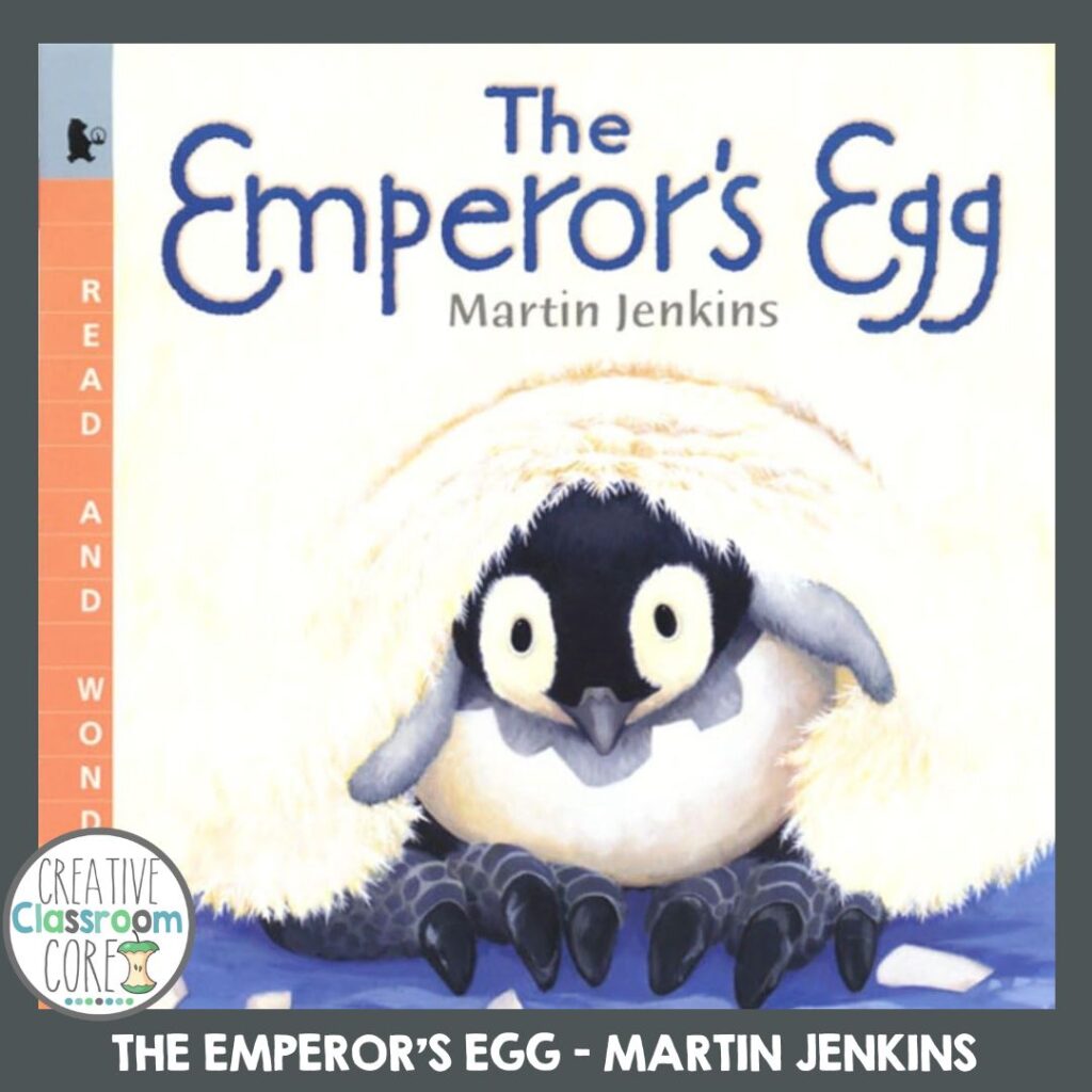 Book cover of "The Emperor's Egg" by Martin Jenkins, perfectly timed for National Penguin Day, featuring a cartoon penguin nestled under a fluffy white surface.