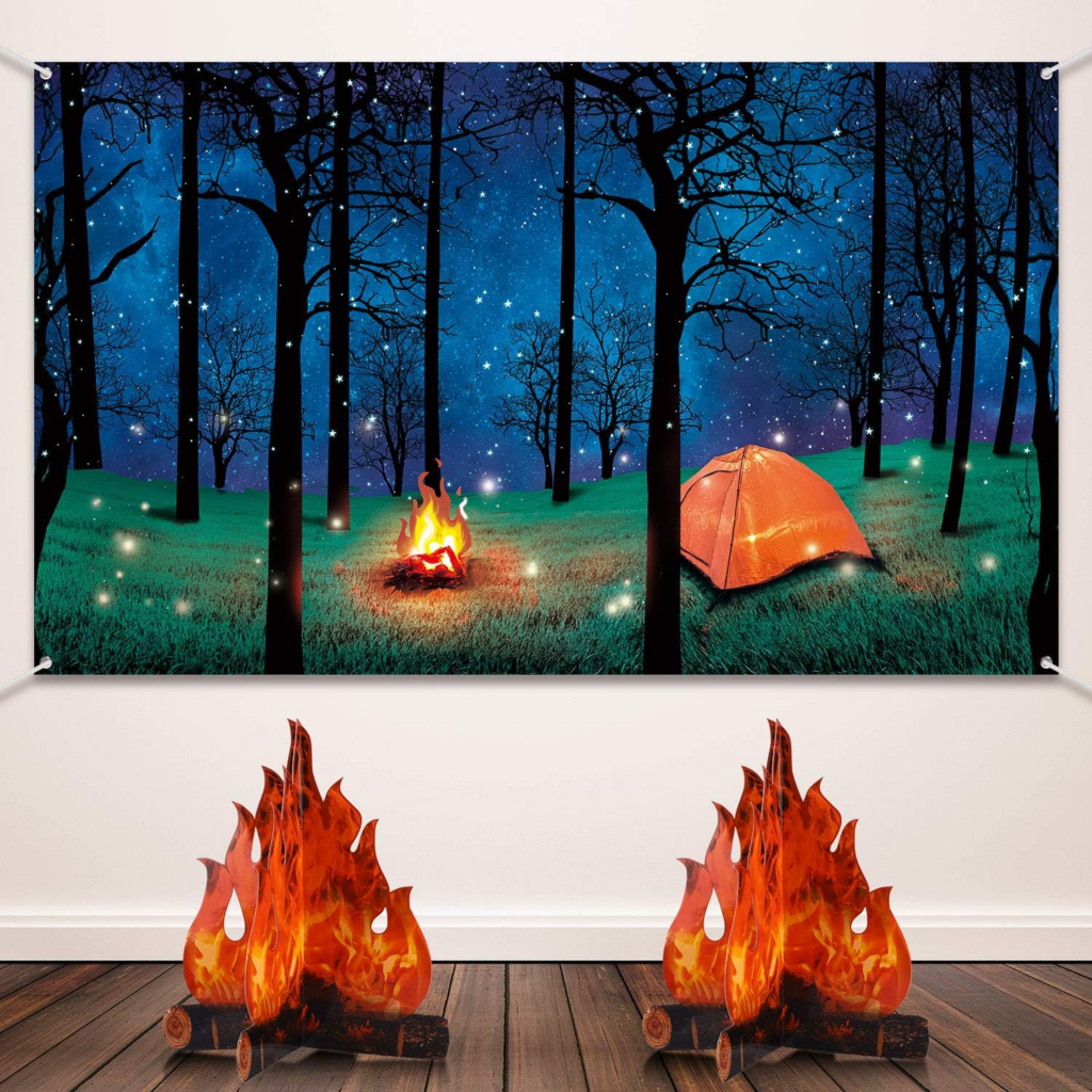 Wall art depicting a glowing orange tent and campfire in a forest under a starry night sky brings inspiration to creative classrooms. Two flame-shaped sculptures on the wooden floor add warmth, making it an ideal reward idea for imaginative spaces.